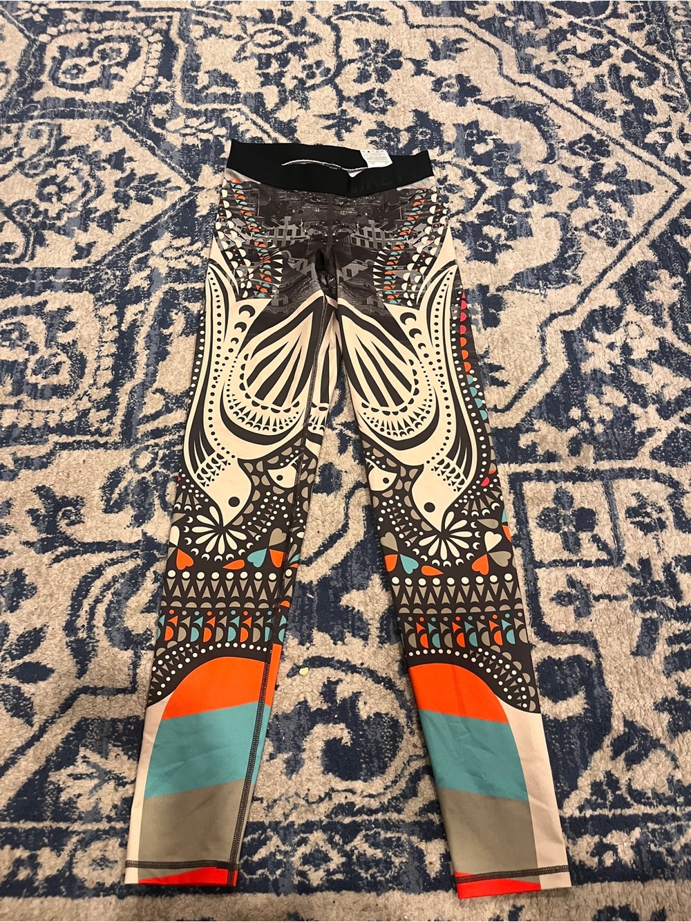 Nike Multicolor Tribal Print Leggings with Teal and Orange Accents